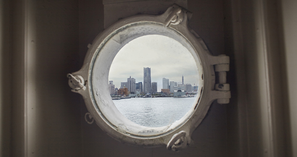 Minatomirai, built on the former site of the Yokohama shipyard of Mitsubishi Heavy Industries, as seen from inside the Hikawa Maru, which was constructed and launched there.
