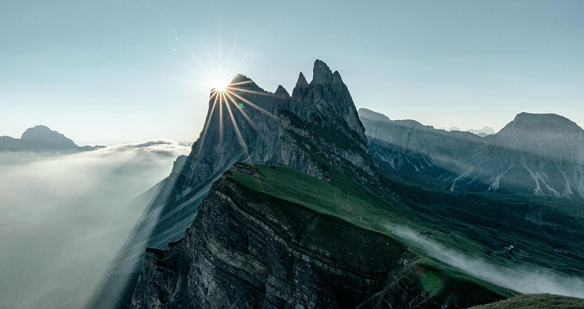 sunrise-seceda-dolomites-italy-sun-hitting.jpg