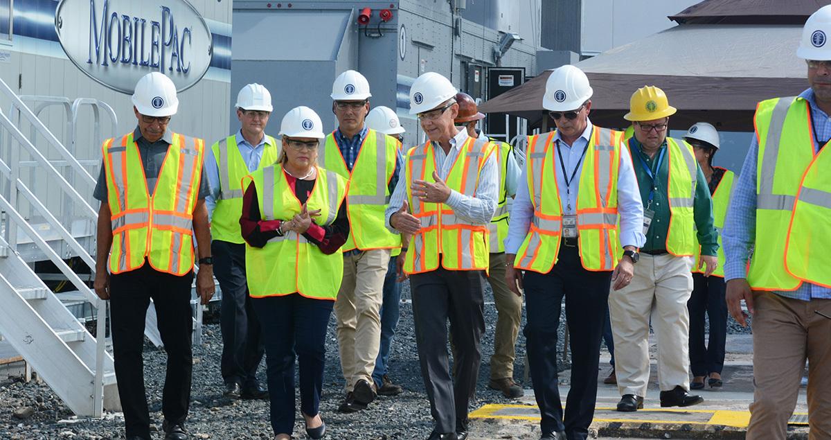 walking_and_talking_in_construction_hats.jpg